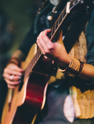 person playing guitar